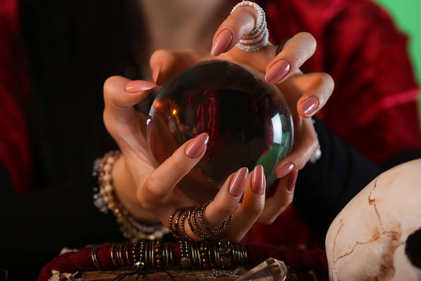 Fortune teller with crystal ball, closeup - Photo, Image