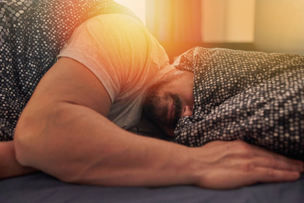 Man still sleeping in the morning, unwilling to get up - Fotografie, Obrázek