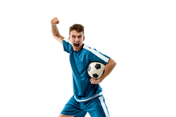 Funny emotions of professional soccer player isolated on white studio background, excitement in game - Photo, Image
