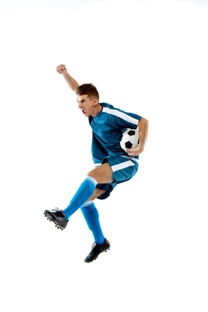 Funny emotions of professional soccer player isolated on white studio background, excitement in game - Fotoğraf, Görsel