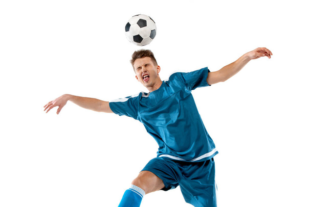 Funny emotions of professional soccer player isolated on white studio background, excitement in game - Φωτογραφία, εικόνα