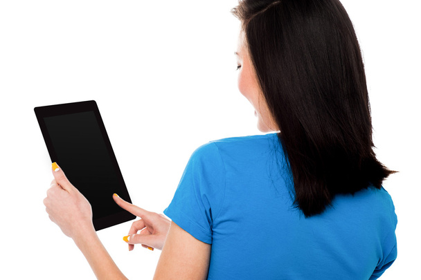 Woman using digital tablet computer  - Фото, изображение