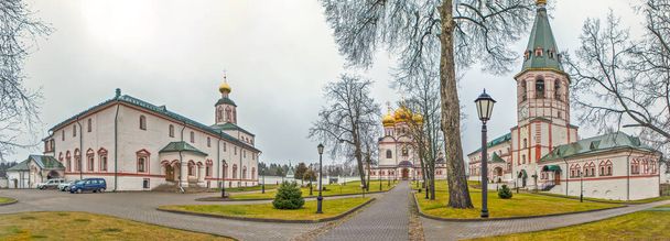 panoramic view of Iversky Monastery territory with parked cars, Valdai, Russia - Photo, Image