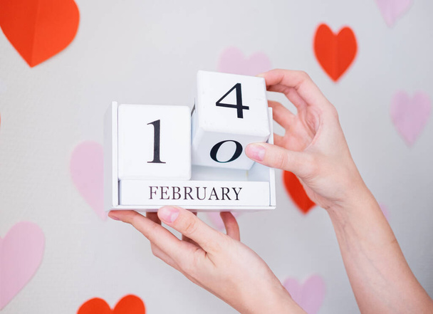 14 February date calendar. Saint Valentines celebration concept. Holiday and symbols - Foto, Imagen