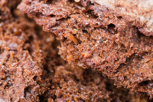 The texture of a loaf of round rye bread, close-up. - Photo, Image