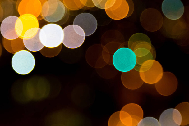The abstract bokeh lights in the dark - Photo, Image