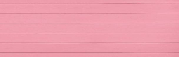 Pink wooden texture background. Copy space, text place. Wood finish material shop. Natural banner. Painted plank timber. Wall lining. Rustic mockup. Indoor interior. Horizontal lines. Spring color. - Photo, Image