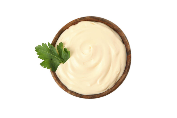 Wooden bowl with mayonnaise isolated on white background - Photo, Image