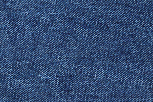 Textuur van blauwe stof voor kleding. - Foto, afbeelding