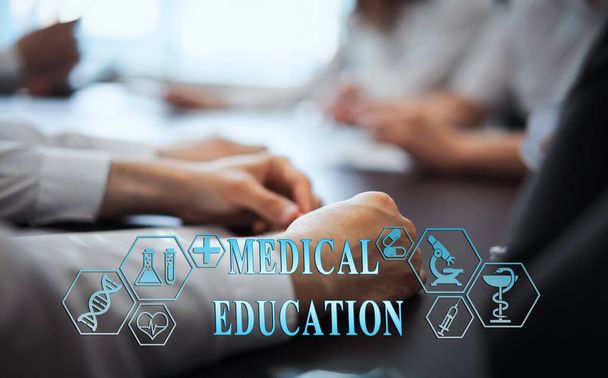 A group of doctors in a modern clinic is planned. The concept of modern medicine and medical biotenology. Medical icons on the screen with the inscription: MEDICAL EDUCATION - Photo, image