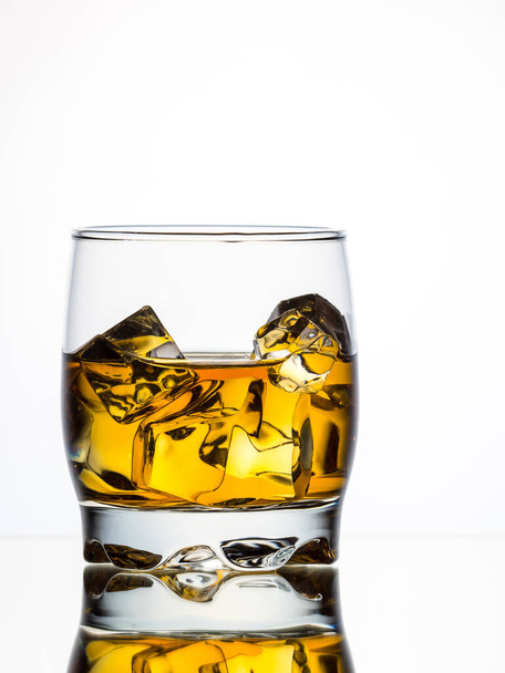 Whisky on the rocks on white background - Foto, afbeelding