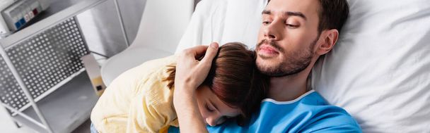 diseased father embracing daughter while lying in hospital, banner - Photo, Image