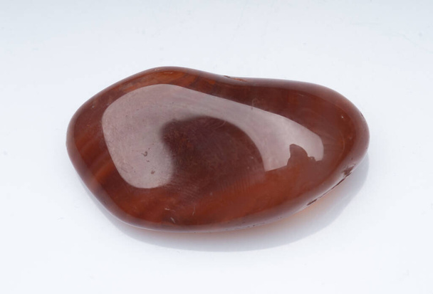 Natural stone carnelian on a white background - Photo, Image