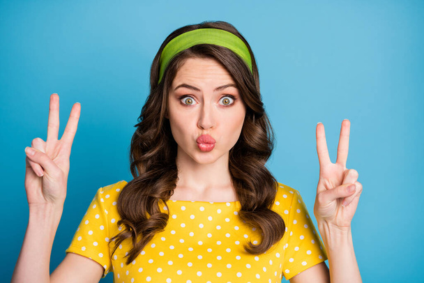 Portrait of lovely pretty girl make v-sign send air kiss isolated over blue color background - Zdjęcie, obraz