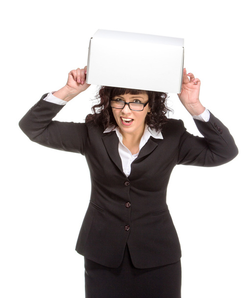 Portrait of mature woman with box, wearing glasses, looking at c - Foto, immagini