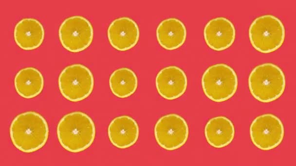 Oranges animated against colourful background - Footage, Video