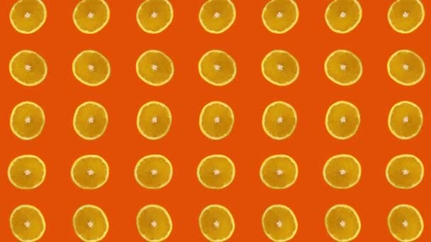 Sarı arkaplanda portakallar canlandı - Video, Çekim