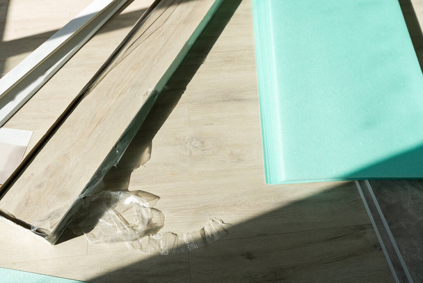 repair laminate flooring, Installing parquet - Foto, Bild