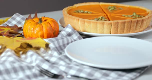 Putting of tasty pumpkin pie slice on plate - Footage, Video