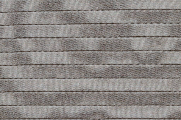 La texture d'un pull léger tricoté. - Photo, image