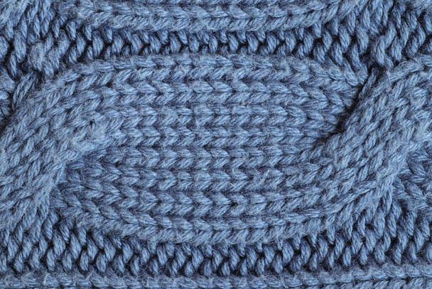 Kék kötött pulóverszövet textúrája. - Fotó, kép