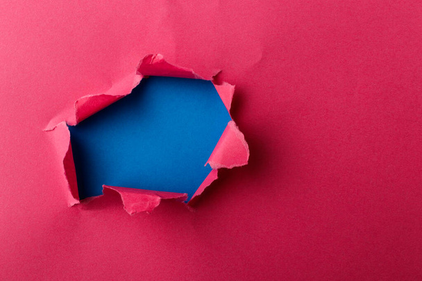 Ripped paper, space for copy. Vivid pink torn paper sheet. Minimal abstract colorful wallpaper concept. - Photo, image