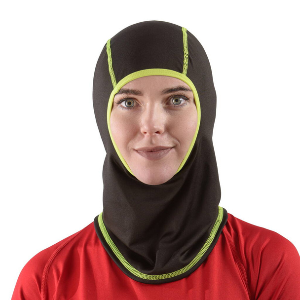 pretty brunette with long hair in a red shirt with a black balaclava with neon green edging - Fotoğraf, Görsel