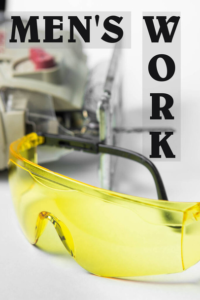 Men's work. Employment concept. Hard work. Yellow construction glasses. Work tool. - Photo, Image