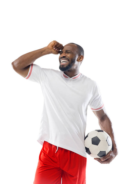Funny emotions of professional football, soccer player isolated on white studio background, excitement in game - Fotoğraf, Görsel