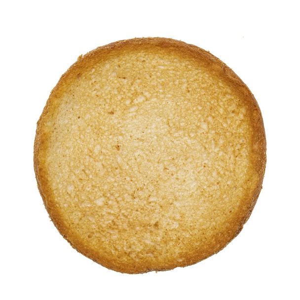 Вид зверху на золотий підсмажений круглий тост під назвою beschuit. Ізольовані на білому тлі
. - Фото, зображення
