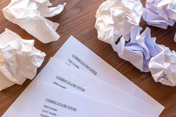 Resumes trashed and shredded, and next resume accepted and retained. - Photo, Image