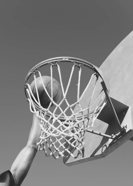 Black and white photo of Player Dunking the Ball - Foto, immagini