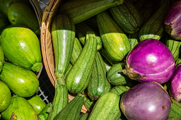 Fresh vegetables for sale on a market stall - 写真・画像