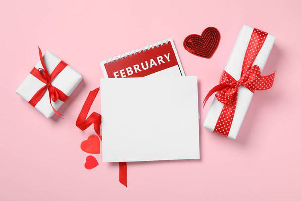 Flat lay composition with blank card on pink background, space for text. Valentine's Day celebration - Photo, Image