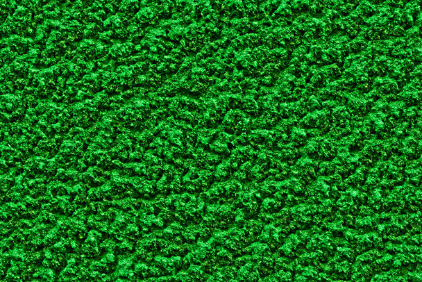 Fondo sólido verde brillante con textura áspera del yeso.  - Foto, Imagen