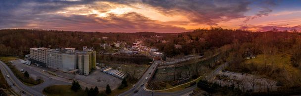 Sunset aerial panorama of Historic Old Ellicott City Maryland, USA typical civil war era small town with the oldest train station, rebuilding after deadly floods - Photo, Image