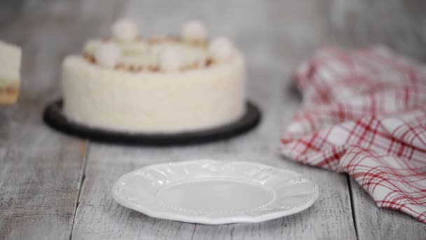 Piece of delicious coconut mousse cake with almonds. - Footage, Video