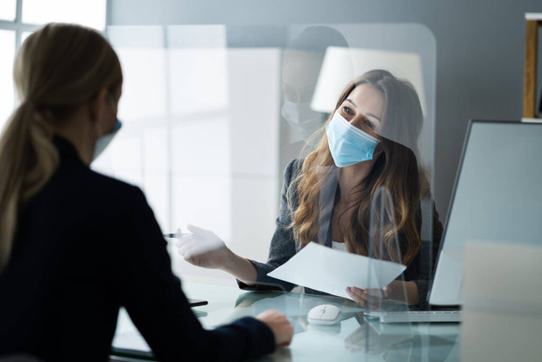 Financial Advisor Or Tax Consultant Wearing Medical Face Mask - Foto, immagini