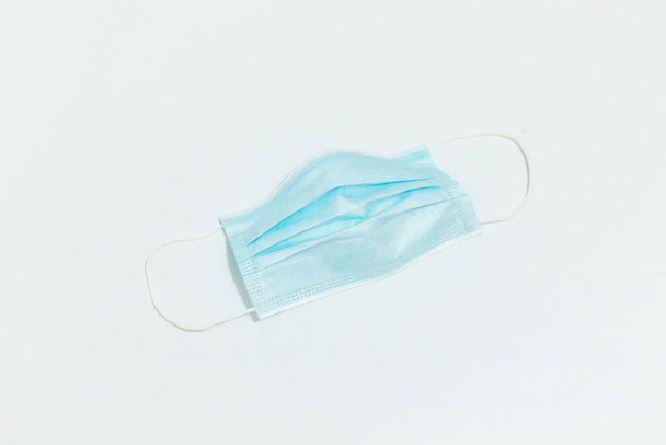 An isolated shot of a disposable facemask on a white background-concept COVID19 pandemic prevention - Φωτογραφία, εικόνα