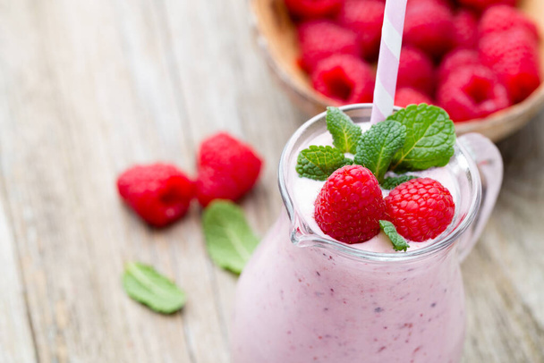 Raspberry milk shake with mint decor. - Φωτογραφία, εικόνα