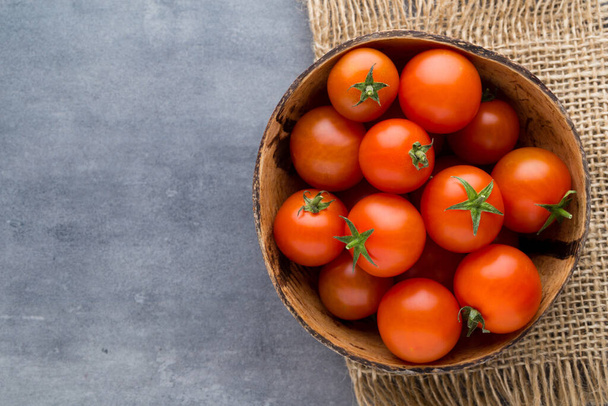 Tomato on the gray background. - Foto, Imagem