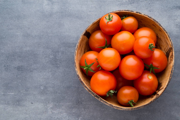 Tomato on the gray background. - Fotografie, Obrázek