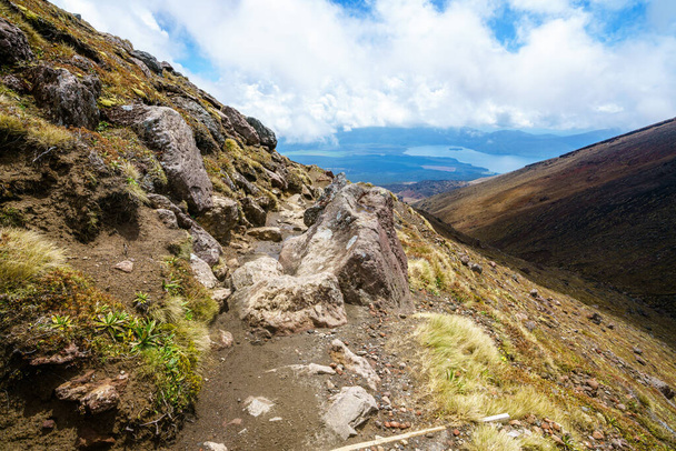 hiking the tongariro alpine crossing on cone volcano mount ngauruhoe in new zealand - 写真・画像