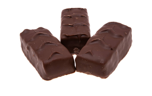 chocoladereep met noten geïsoleerd op witte achtergrond - Foto, afbeelding