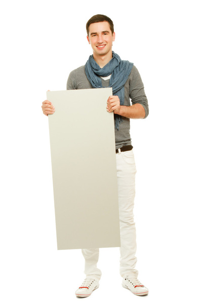 A handsoma man holding a blank - Foto, immagini
