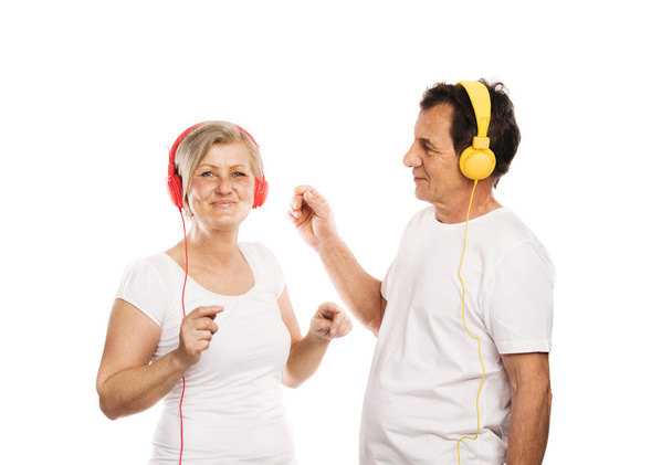 Senior couple with headphones - Фото, зображення