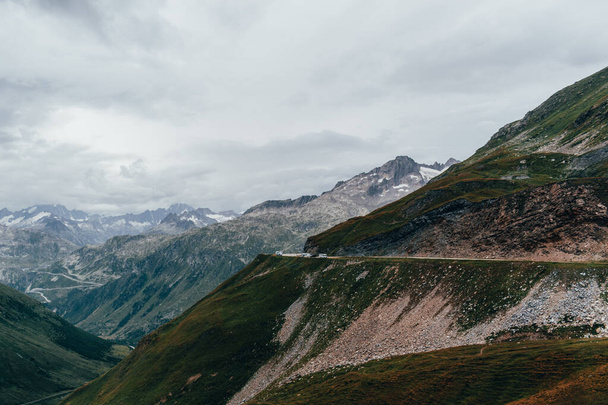 Landscape of green mountains in Switzerland - Foto, Bild