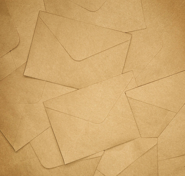 Brown Enveloppen achtergrond textuur, bruin effen papier, kopieer ruimte bovenaanzicht - Foto, afbeelding