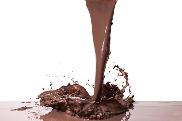 Salpicadura de chocolate caliente
 - Foto, Imagen