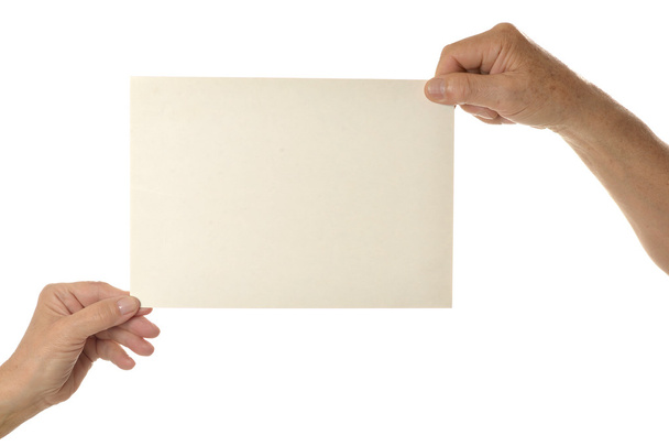 Mani con carta bianca
 - Foto, immagini